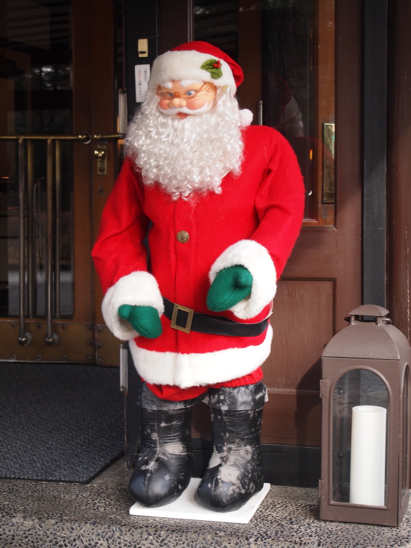 Santa Claus came to Manpei Hotel entrance on Dec 24, 2015.